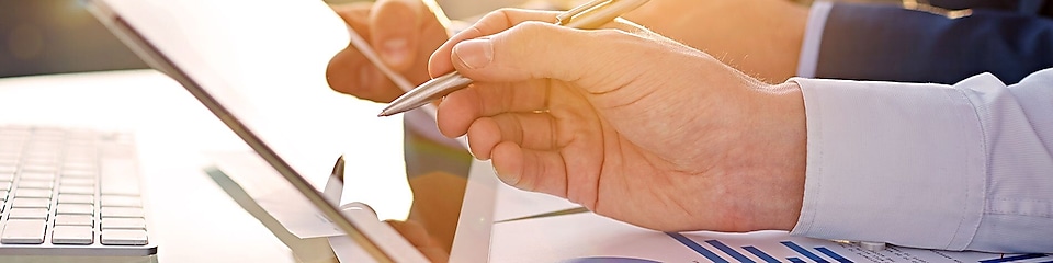 office worker reviewing on tablet